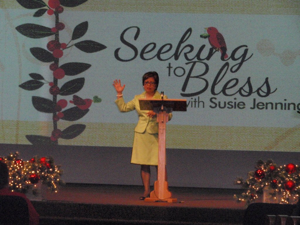 Susie speaking at Seeking to Bless event