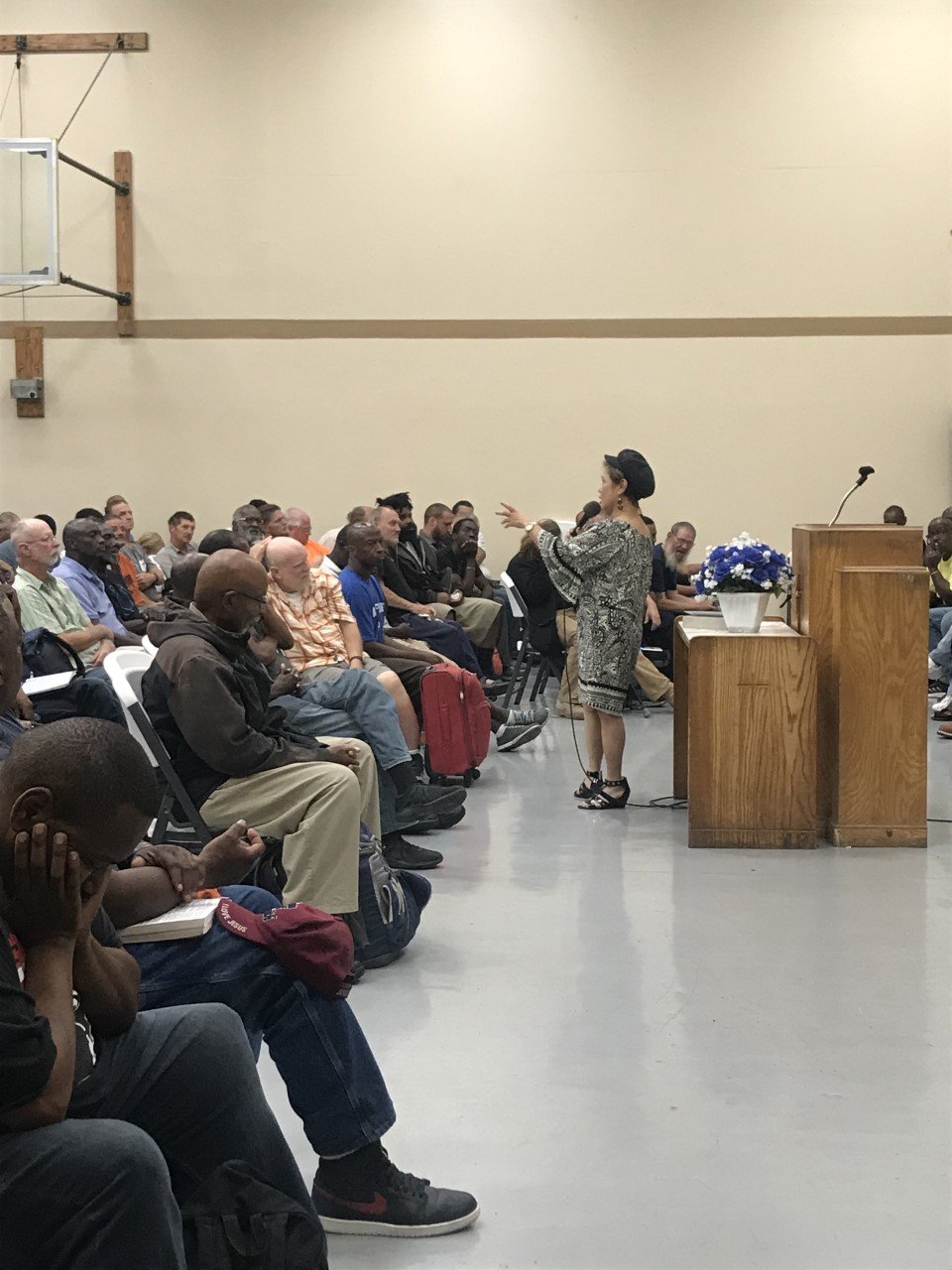 Susie Y. Jennings, R.N. on stage — credentials and speaking history